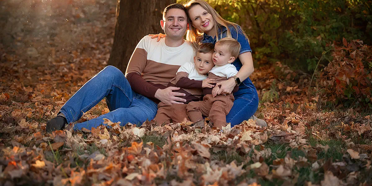 Family walking through autumn light in Washington DC